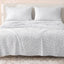 Sofia Home Textiles Printed Bedsheets - Sofia Floral Branches Printed Double Flat Bedsheet Set 4 Pcs (240 × 260 cm) in Grey spread on a double bed - مفروشات صوفيا - ملايات مطبوعة - طقم ملاية صوفيا فروع ورد دبل مسطحة 4 قطع (240 × 260 سم) باللون رمادي مفروش على سرير دبل