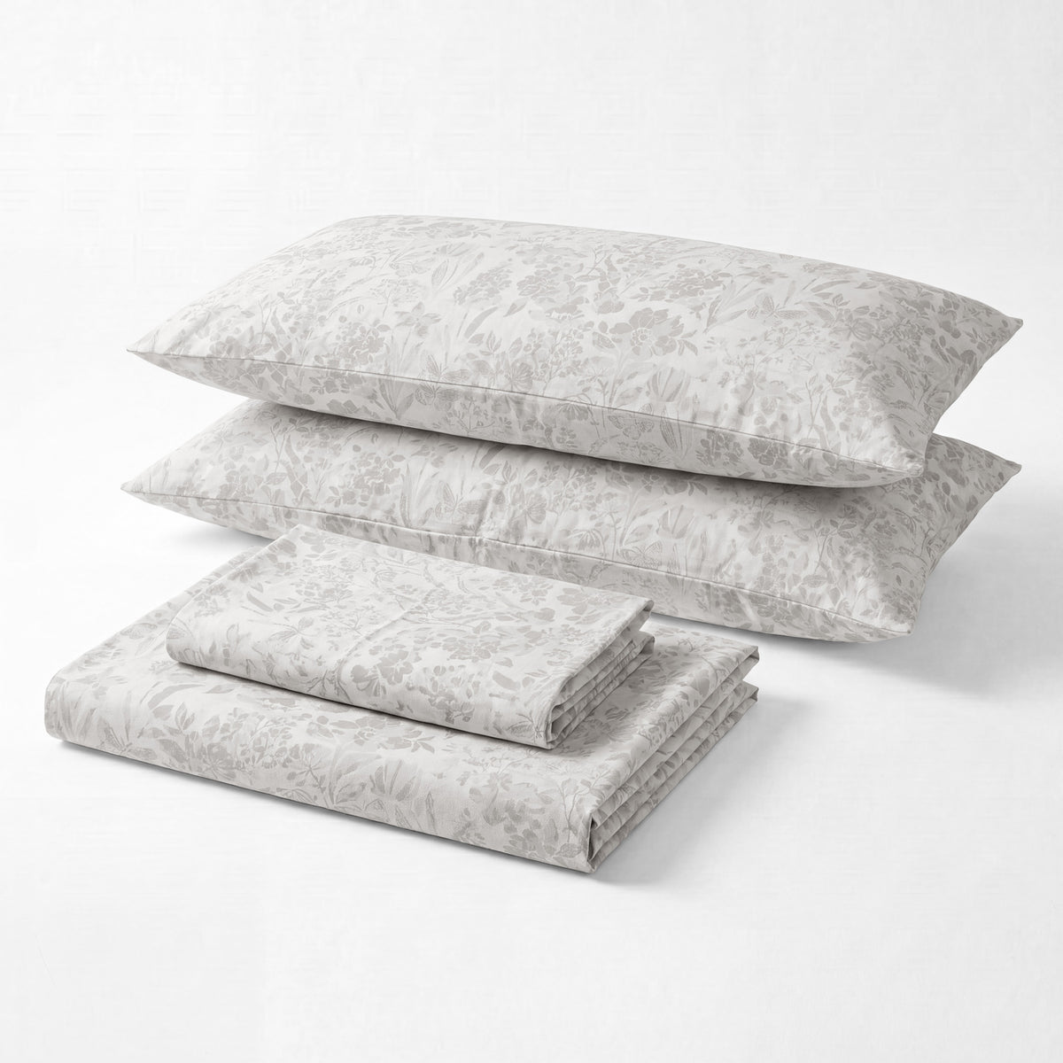 Sofia Home Textiles Printed Bedsheets - Sofia Flowers Printed Double Flat Bedsheet Set 4 Pcs in Grey folded full set on a white background - مفروشات صوفيا - ملايات مطبوعة - طقم ملاية صوفيا ورد دبل مسطحة 4 قطع باللون رمادي مطوي كامل على خلفية بيضاء