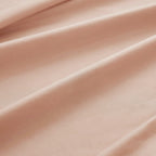 Sofia Home Textiles Bedsheets - 100% microfiber texture of Sofia Single Plain Bedsheet Set 3 Pieces (180 × 240 cm) in Salmon, close-up shot - مفروشات صوفيا - ملايات - ملمس مايكروفايبر 100% في طقم ملاية صوفيا سادة سنجل  3 قطع (180 × 240 سم) باللون سالمون، لقطة مقربة