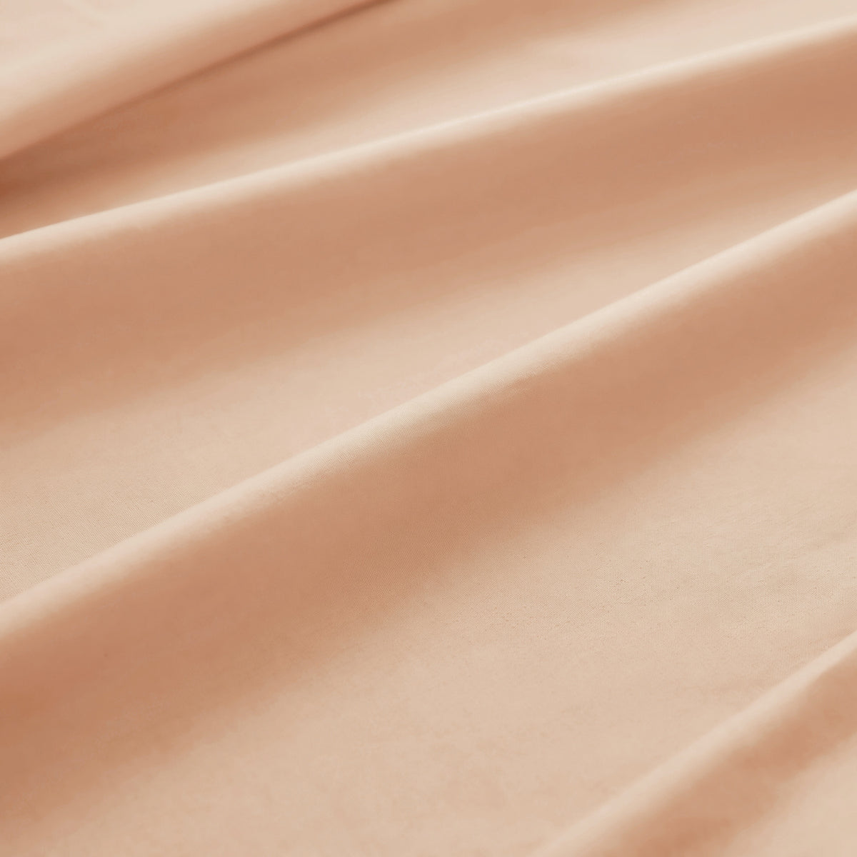 Sofia Home Textiles Bedsheets - 100% microfiber texture of Sofia Single Plain Bedsheet Set 3 Pieces (180 × 240 cm) in Orange, close-up shot - مفروشات صوفيا - ملايات - ملمس مايكروفايبر 100% في طقم ملاية صوفيا سادة سنجل  3 قطع (180 × 240 سم) باللون برتقالي، لقطة مقربة