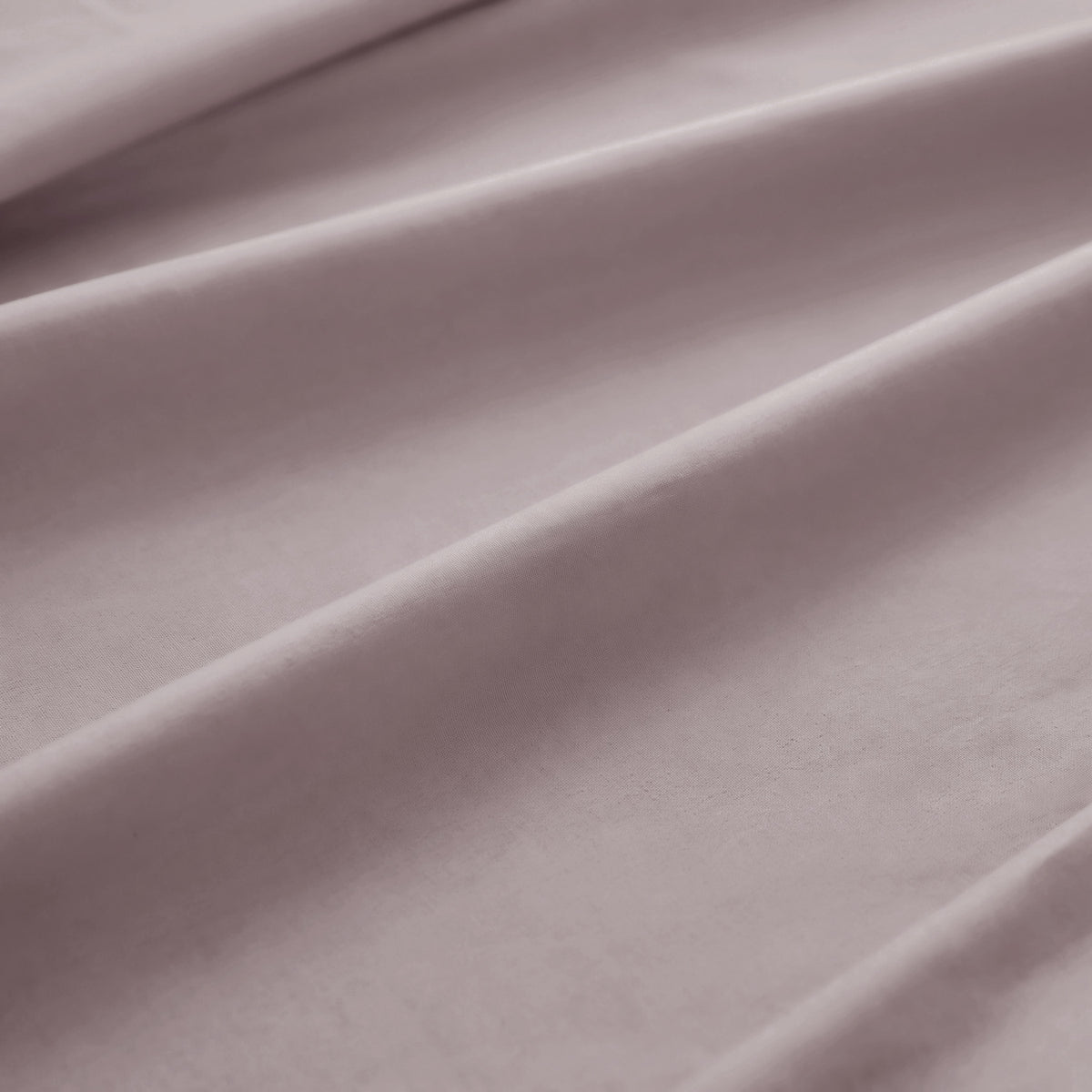 Sofia Home Textiles Bedsheets - 100% microfiber texture of Sofia Single Plain Bedsheet Set 3 Pieces (180 × 240 cm) in Purple, close-up shot - مفروشات صوفيا - ملايات - ملمس مايكروفايبر 100% في طقم ملاية صوفيا سادة سنجل  3 قطع (180 × 240 سم) باللون موف، لقطة مقربة