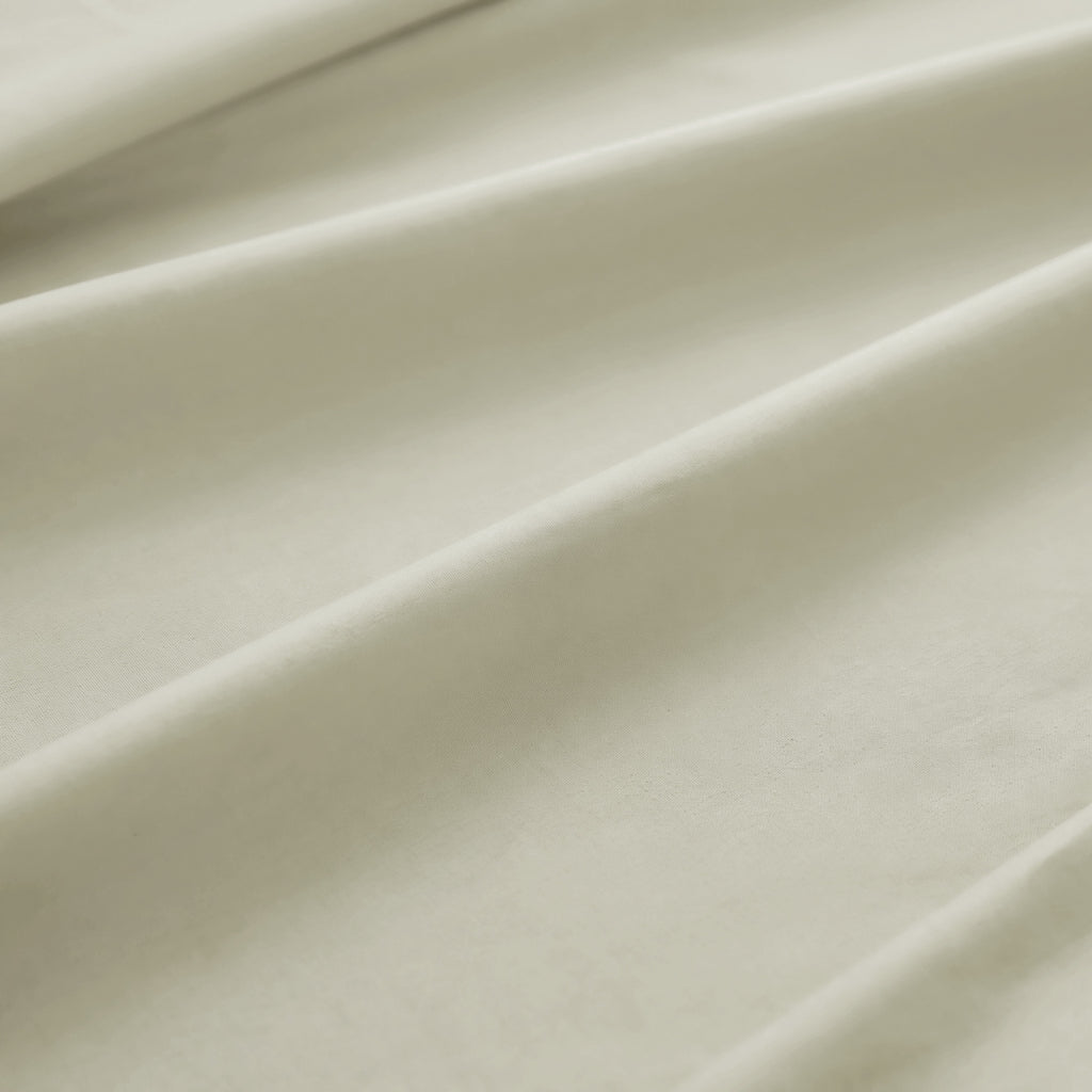 Sofia Home Textiles Bedsheets - 100% microfiber texture of Sofia Double Plain Bedsheet Set 5 Pieces (240 × 260 cm) in Light Beige, close-up shot - مفروشات صوفيا - ملايات - ملمس مايكروفايبر 100% في طقم ملاية صوفيا سادة دبل  5 قطع (240 × 260 سم) باللون بيج فاتح، لقطة مقربة