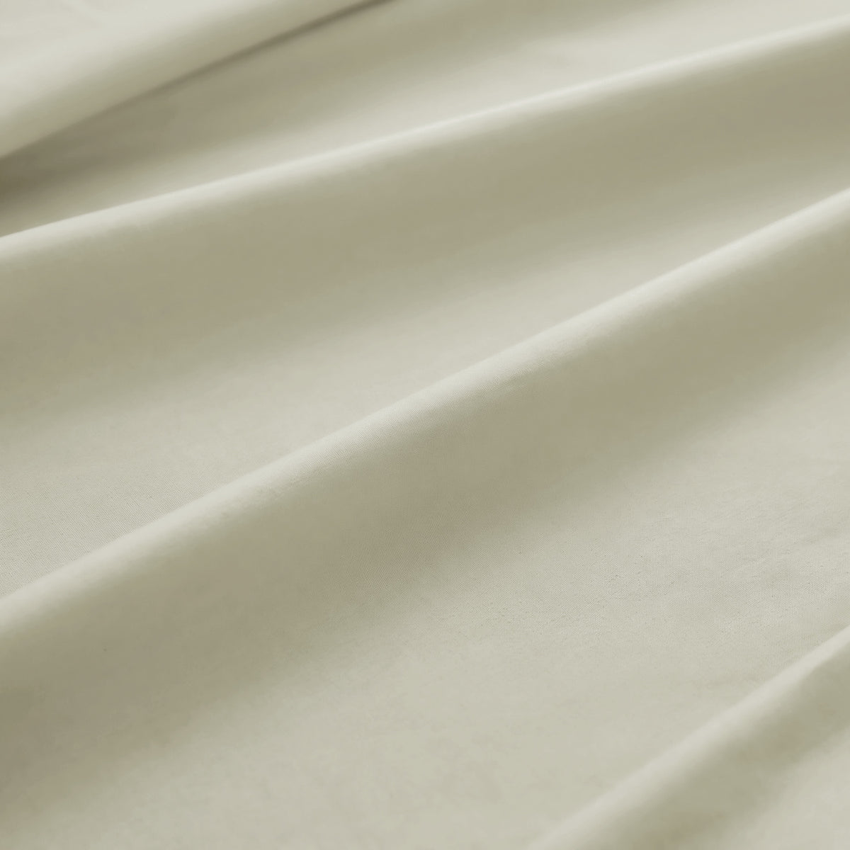 Sofia Home Textiles Bedsheets - 100% microfiber texture of Sofia Double Plain Bedsheet Set 5 Pieces (240 × 260 cm) in Light Beige, close-up shot - مفروشات صوفيا - ملايات - ملمس مايكروفايبر 100% في طقم ملاية صوفيا سادة دبل  5 قطع (240 × 260 سم) باللون بيج فاتح، لقطة مقربة