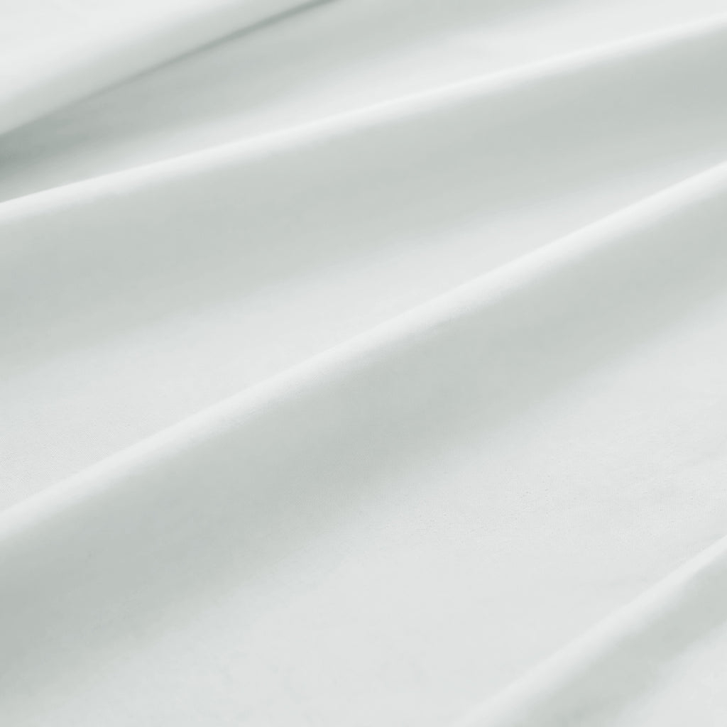 Sofia Home Textiles Bedsheets - 100% microfiber texture of Sofia Single Plain Bedsheet Set 3 Pieces (180 × 240 cm) in White, close-up shot - مفروشات صوفيا - ملايات - ملمس مايكروفايبر 100% في طقم ملاية صوفيا سادة سنجل  3 قطع (180 × 240 سم) باللون أبيض، لقطة مقربة