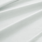 Sofia Home Textiles Bedsheets - 100% microfiber texture of Sofia Single Plain Bedsheet Set 3 Pieces (180 × 240 cm) in White, close-up shot - مفروشات صوفيا - ملايات - ملمس مايكروفايبر 100% في طقم ملاية صوفيا سادة سنجل  3 قطع (180 × 240 سم) باللون أبيض، لقطة مقربة