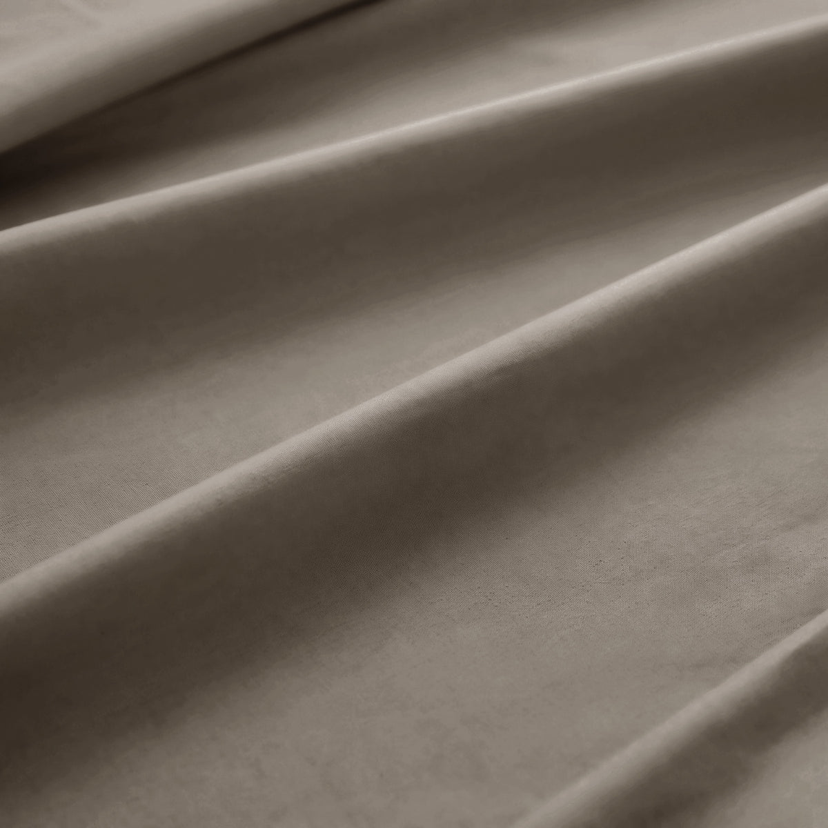 Sofia Home Textiles Bedsheets - 100% microfiber texture of Sofia Single Plain Bedsheet Set 3 Pieces (180 × 240 cm) in Camel, close-up shot - مفروشات صوفيا - ملايات - ملمس مايكروفايبر 100% في طقم ملاية صوفيا سادة سنجل  3 قطع (180 × 240 سم) باللون جملي، لقطة مقربة
