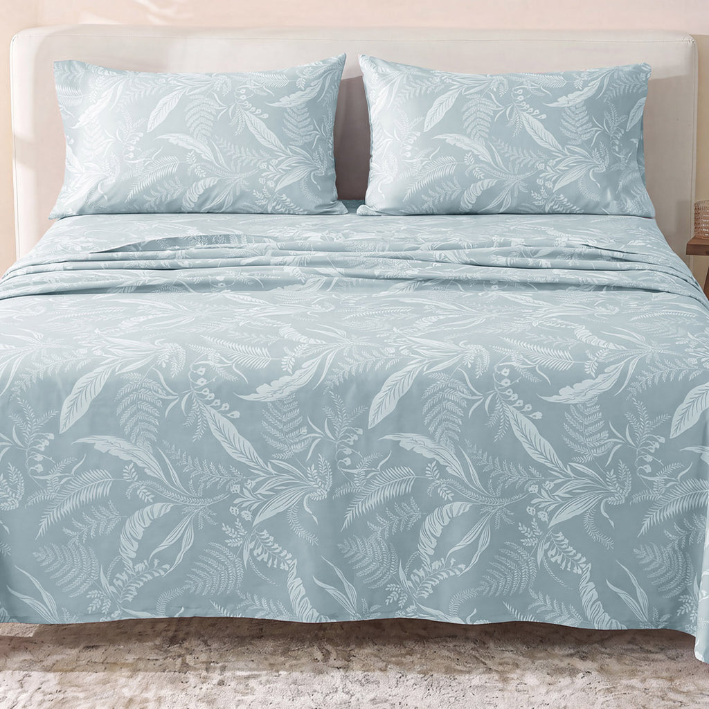 Sofia Home Textiles Printed Bedsheets - Sofia Tree Branches Printed Double Flat Bedsheet Set 4 Pcs (240 × 260 cm) in Light Blue spread on a double bed - مفروشات صوفيا - ملايات مطبوعة - طقم ملاية صوفيا فروع شجر دبل مسطحة 4 قطع (240 × 260 سم) باللون أزرق فاتح مفروش على سرير دبل