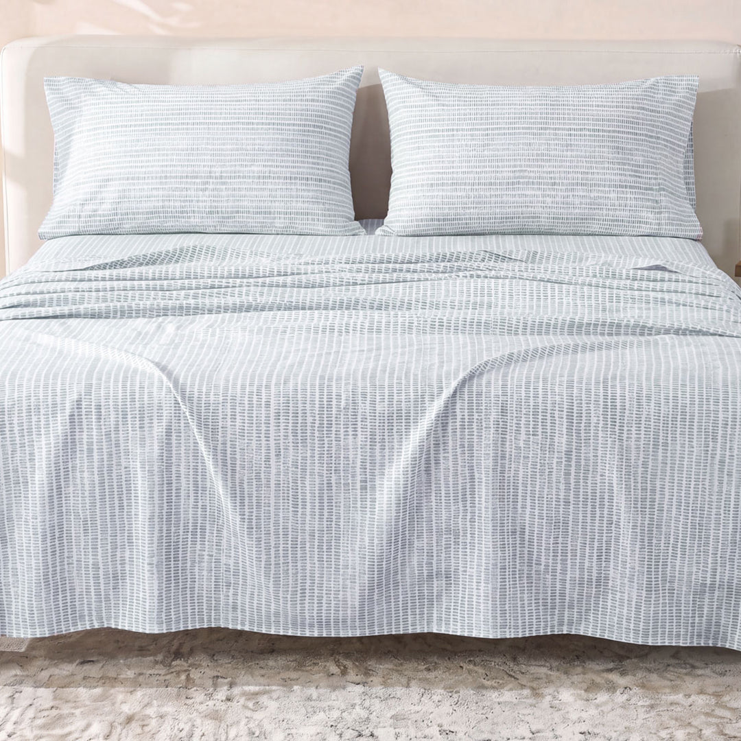 Sofia Home Textiles Printed Bedsheets - Sofia Lines Printed Double Flat Bedsheet Set 4 Pcs (240 × 260 cm) in Mint spread on a double bed - مفروشات صوفيا - ملايات مطبوعة - طقم ملاية صوفيا خطوط دبل مسطحة 4 قطع (240 × 260 سم) باللون مينت مفروش على سرير دبل