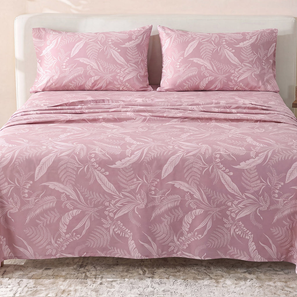 Sofia Home Textiles Printed Bedsheets - Sofia Tree Branches Printed Double Flat Bedsheet Set 4 Pcs (240 × 260 cm) in Rose spread on a double bed - مفروشات صوفيا - ملايات مطبوعة - طقم ملاية صوفيا فروع شجر دبل مسطحة 4 قطع (240 × 260 سم) باللون وردي مفروش على سرير دبل