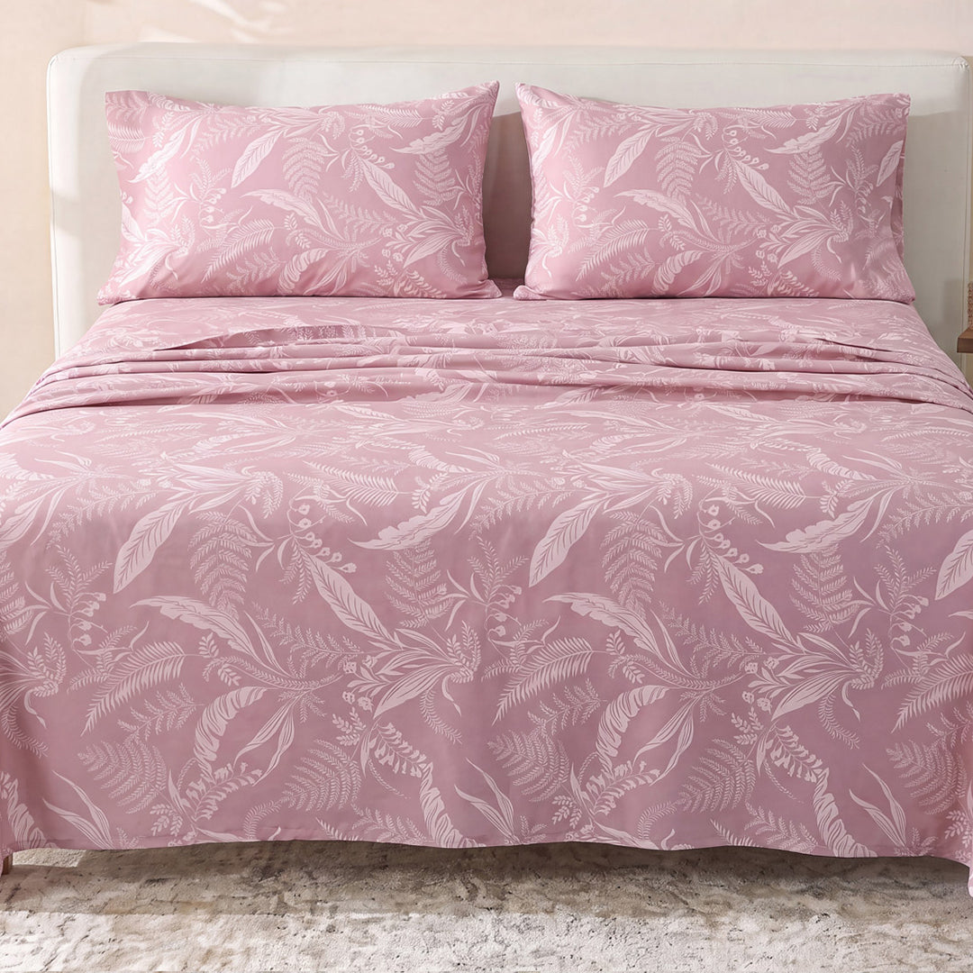 Sofia Home Textiles Printed Bedsheets - Sofia Tree Branches Printed Double Flat Bedsheet Set 4 Pcs (240 × 260 cm) in Rose spread on a double bed - مفروشات صوفيا - ملايات مطبوعة - طقم ملاية صوفيا فروع شجر دبل مسطحة 4 قطع (240 × 260 سم) باللون وردي مفروش على سرير دبل
