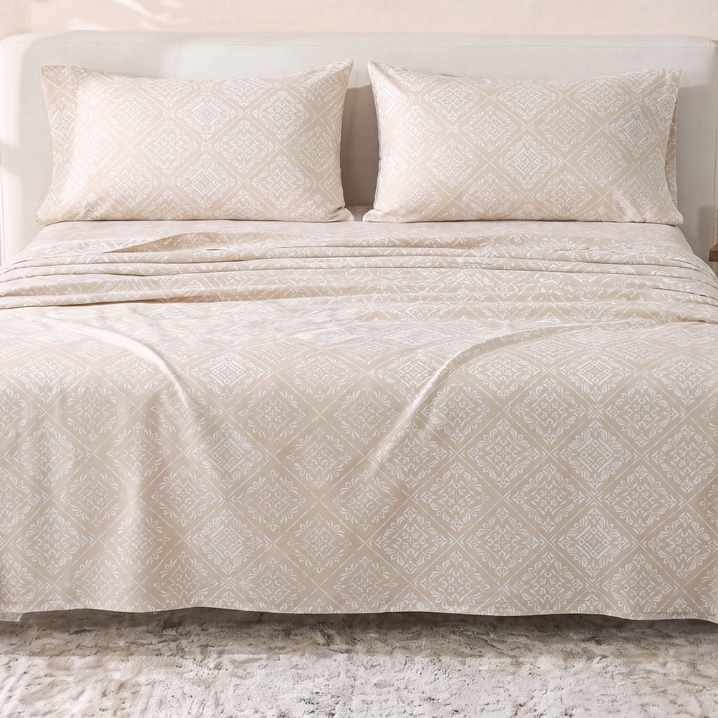 Sofia Home Textiles Printed Bedsheets - Sofia Flower Squares Printed Double Flat Bedsheet Set 4 Pcs (240 × 260 cm) in Beige spread on a double bed -  مفروشات صوفيا - ملايات مطبوعة - طقم ملاية صوفيا مربعات ورد دبل مسطحة 4 قطع (240 × 260 سم) باللون بيج مفروش على سرير دبل