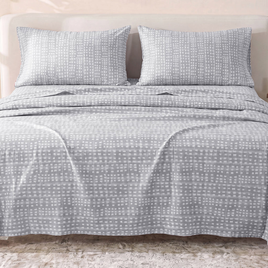 Sofia Home Textiles Printed Bedsheets - Sofia Small Checks Printed Double Flat Bedsheet Set 4 Pcs (240 × 260 cm) in Grey spread on a double bed - مفروشات صوفيا - ملايات مطبوعة - طقم ملاية صوفيا مربعات صغيرة دبل مسطحة 4 قطع (240 × 260 سم) باللون رمادي مفروش على سرير دبل