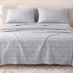 Sofia Home Textiles Printed Bedsheets - Sofia Small Checks Printed Double Flat Bedsheet Set 4 Pcs (240 × 260 cm) in Grey spread on a double bed - مفروشات صوفيا - ملايات مطبوعة - طقم ملاية صوفيا مربعات صغيرة دبل مسطحة 4 قطع (240 × 260 سم) باللون رمادي مفروش على سرير دبل