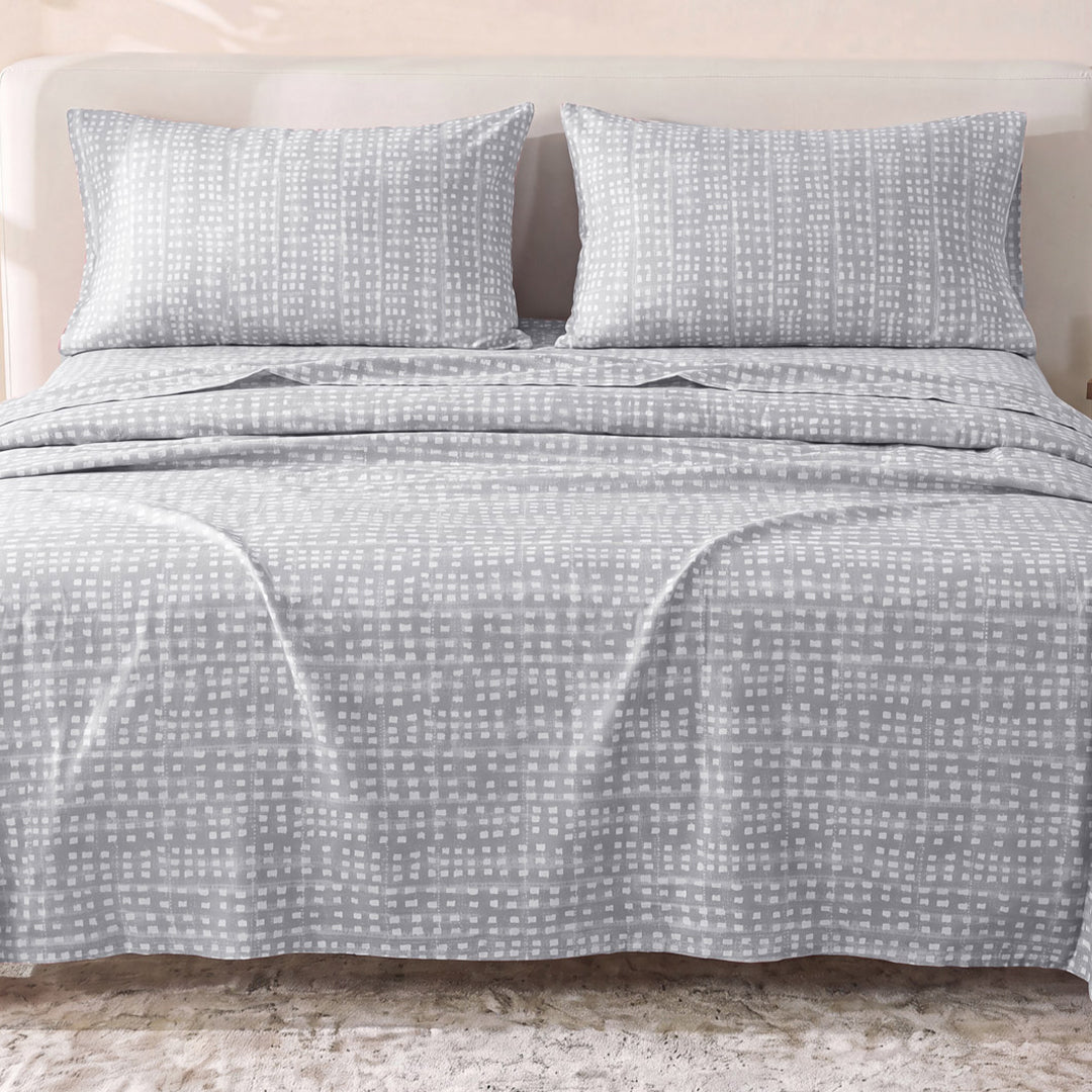 Sofia Home Textiles Printed Bedsheets - Sofia Small Checks Printed Double Flat Bedsheet Set 4 Pcs (240 × 260 cm) in Grey spread on a double bed - مفروشات صوفيا - ملايات مطبوعة - طقم ملاية صوفيا مربعات صغيرة دبل مسطحة 4 قطع (240 × 260 سم) باللون رمادي مفروش على سرير دبل