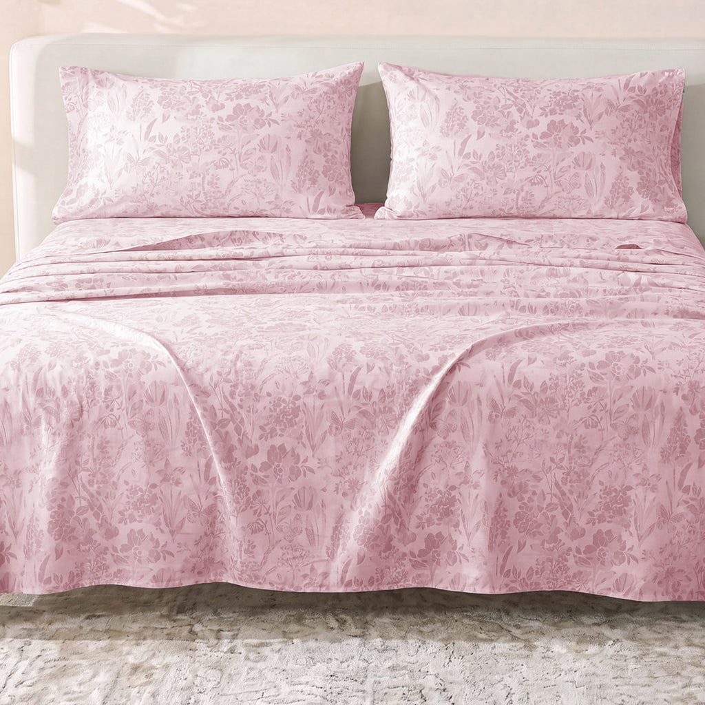 Sofia Home Textiles Printed Bedsheets - Sofia Flowers Printed Double Flat Bedsheet Set 4 Pcs (240 × 260 cm) in Rose spread on a double bed - مفروشات صوفيا - ملايات مطبوعة - طقم ملاية صوفيا ورد دبل مسطحة 4 قطع (240 × 260 سم) باللون وردي مفروش على سرير دبل