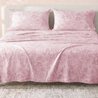 Sofia Home Textiles Printed Bedsheets - Sofia Flowers Printed Double Flat Bedsheet Set 4 Pcs (240 × 260 cm) in Rose spread on a double bed - مفروشات صوفيا - ملايات مطبوعة - طقم ملاية صوفيا ورد دبل مسطحة 4 قطع (240 × 260 سم) باللون وردي مفروش على سرير دبل