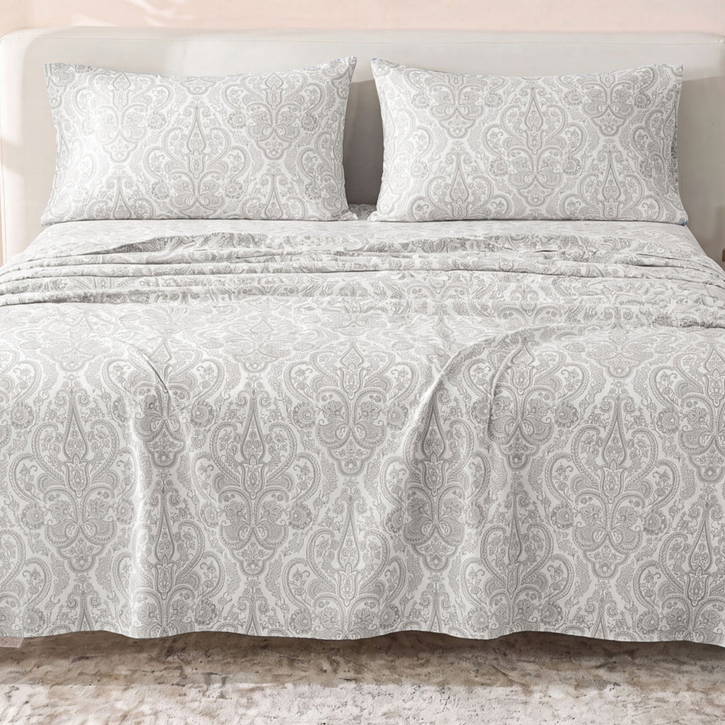 Sofia Home Textiles Printed Bedsheets - Sofia Small Paisley Printed Double Flat Bedsheet Set 4 Pcs (240 × 260 cm) in Grey spread on a double bed - مفروشات صوفيا - ملايات مطبوعة - طقم ملاية صوفيا كشمير صغير دبل مسطحة 4 قطع (240 × 260 سم) باللون رمادي مفروش على سرير دبل