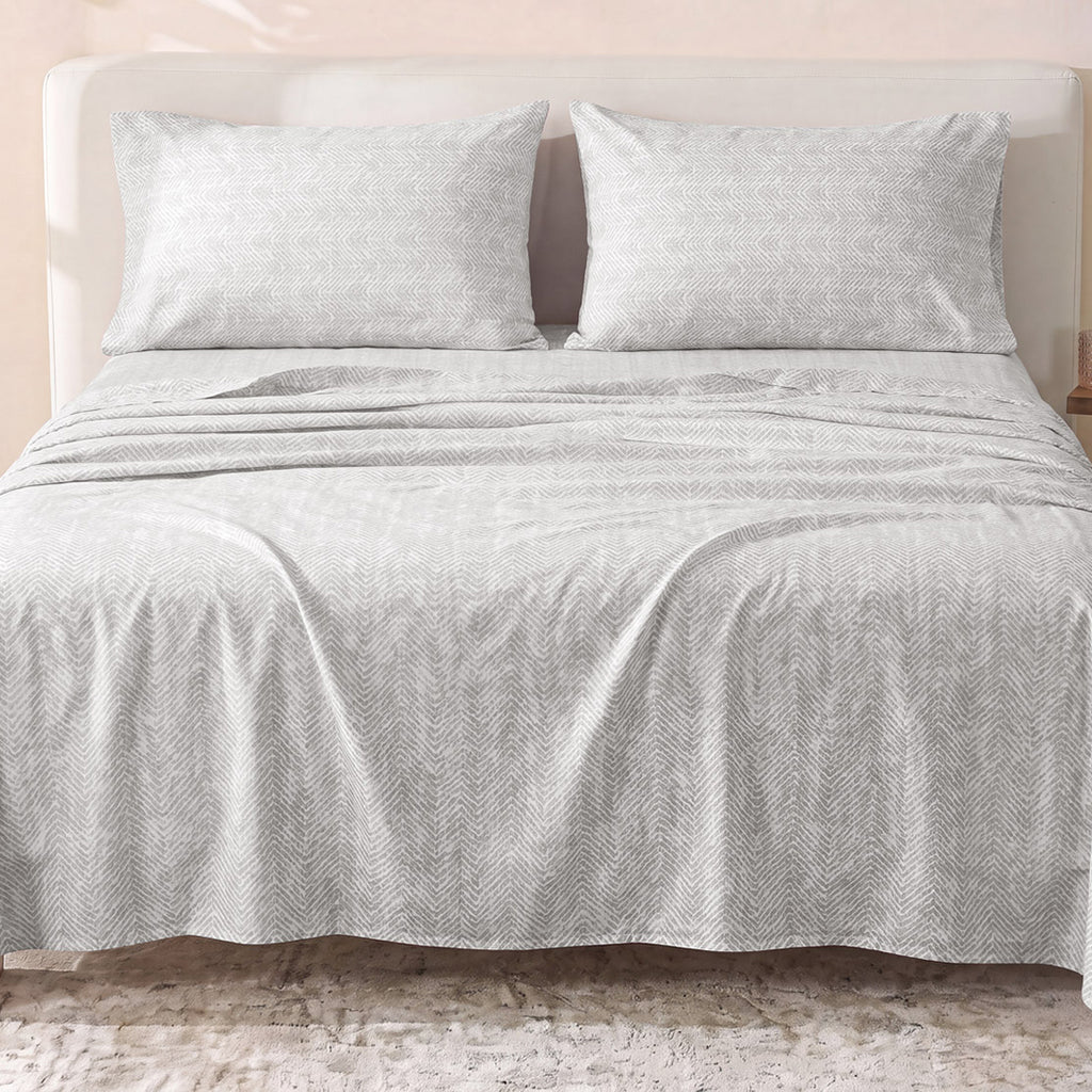 Sofia Home Textiles Printed Bedsheets - Sofia Small Zigzag Printed Double Flat Bedsheet Set 4 Pcs (240 × 260 cm) in Cafe spread on a double bed - مفروشات صوفيا - ملايات مطبوعة - طقم ملاية صوفيا زجزاج صغير دبل مسطحة 4 قطع (240 × 260 سم) باللون كافيه مفروش على سرير دبل