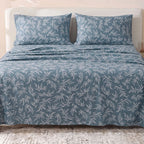Sofia Home Textiles Printed Bedsheets - Sofia Leaves Printed Double Flat Bedsheet Set 4 Pcs (240 × 260 cm) in Petroleum spread on a double bed - مفروشات صوفيا - ملايات مطبوعة - طقم ملاية صوفيا ورق شجر دبل مسطحة 4 قطع (240 × 260 سم) باللون بترولي مفروش على سرير دبل