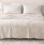 Sofia Home Textiles Printed Bedsheets - Sofia Floral Branches Printed Double Flat Bedsheet Set 4 Pcs (240 × 260 cm) in Beige spread on a double bed - مفروشات صوفيا - ملايات مطبوعة - طقم ملاية صوفيا فروع ورد دبل مسطحة 4 قطع (240 × 260 سم) باللون بيج مفروش على سرير دبل