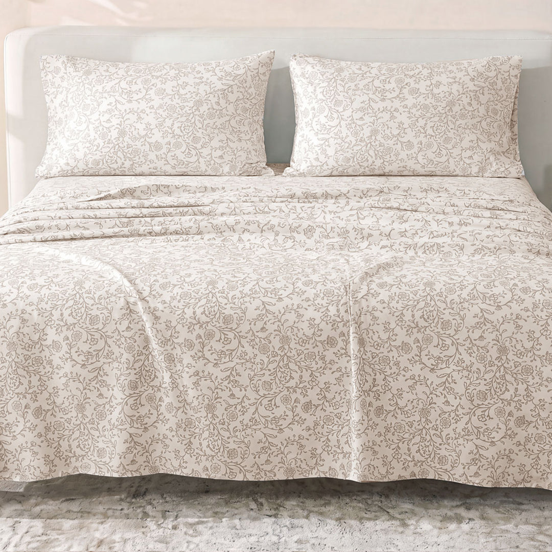 Sofia Home Textiles Printed Bedsheets - Sofia Floral Branches Printed Double Flat Bedsheet Set 4 Pcs (240 × 260 cm) in Beige spread on a double bed - مفروشات صوفيا - ملايات مطبوعة - طقم ملاية صوفيا فروع ورد دبل مسطحة 4 قطع (240 × 260 سم) باللون بيج مفروش على سرير دبل