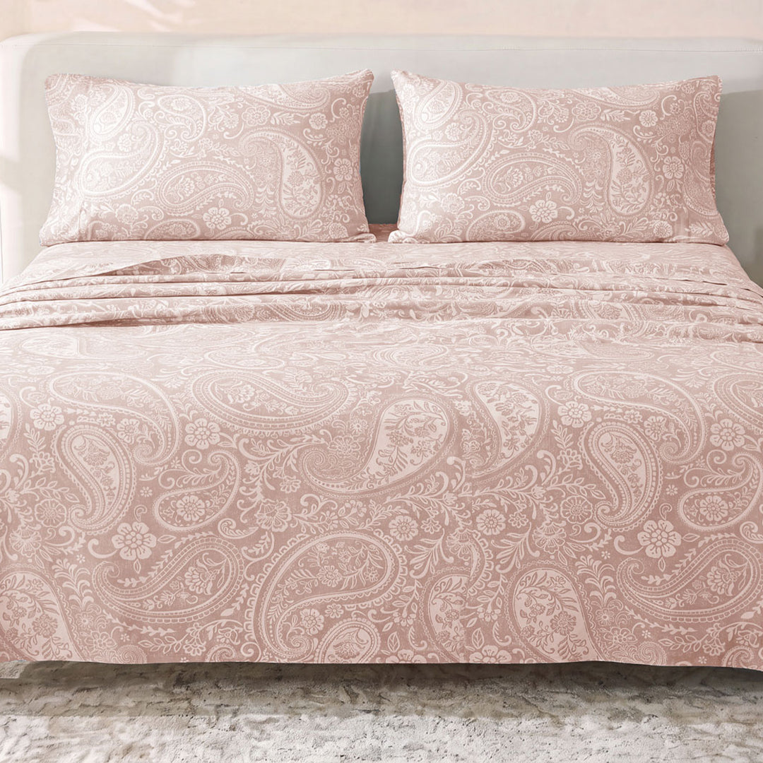 Sofia Home Textiles Printed Bedsheets - Sofia Large Paisley Printed Double Flat Bedsheet Set 4 Pcs (240 × 260 cm) in Rose spread on a double bed - مفروشات صوفيا - ملايات مطبوعة - طقم ملاية صوفيا كشمير كبير دبل مسطحة 4 قطع (240 × 260 سم) باللون وردي مفروش على سرير دبل