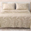 Sofia Home Textiles Printed Bedsheets - Sofia Tree Branches Printed Double Flat Bedsheet Set 4 Pcs (240 × 260 cm) in Beige spread on a double bed - مفروشات صوفيا - ملايات مطبوعة - طقم ملاية صوفيا فروع شجر دبل مسطحة 4 قطع (240 × 260 سم) باللون بيج مفروش على سرير دبل