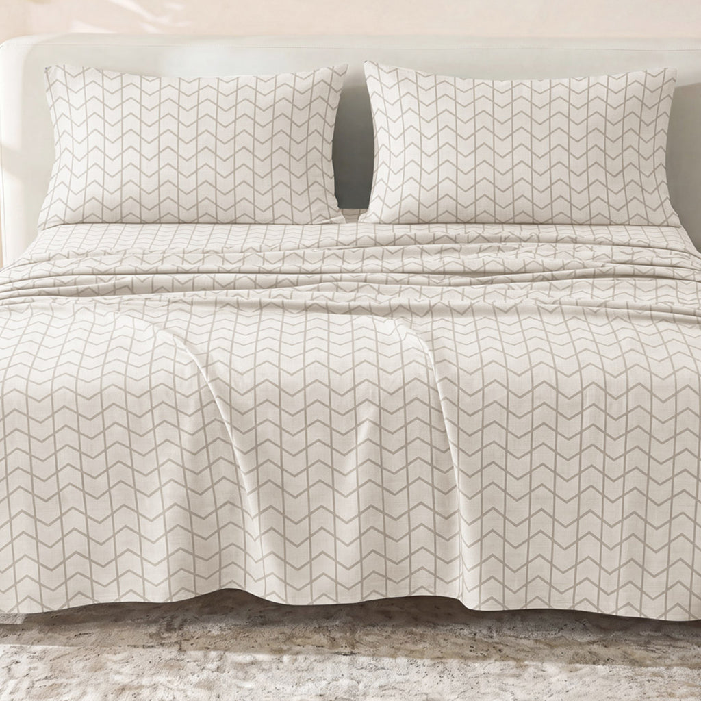 Sofia Home Textiles Printed Bedsheets - Sofia Large Zigzag Printed Double Flat Bedsheet Set 4 Pcs (240 × 260 cm) in Beige spread on a double bed - مفروشات صوفيا - ملايات مطبوعة - طقم ملاية صوفيا زجزاج كبير دبل مسطحة 4 قطع (240 × 260 سم) باللون بيج مفروش على سرير دبل