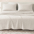 Sofia Home Textiles Printed Bedsheets - Sofia Large Zigzag Printed Double Flat Bedsheet Set 4 Pcs (240 × 260 cm) in Beige spread on a double bed - مفروشات صوفيا - ملايات مطبوعة - طقم ملاية صوفيا زجزاج كبير دبل مسطحة 4 قطع (240 × 260 سم) باللون بيج مفروش على سرير دبل