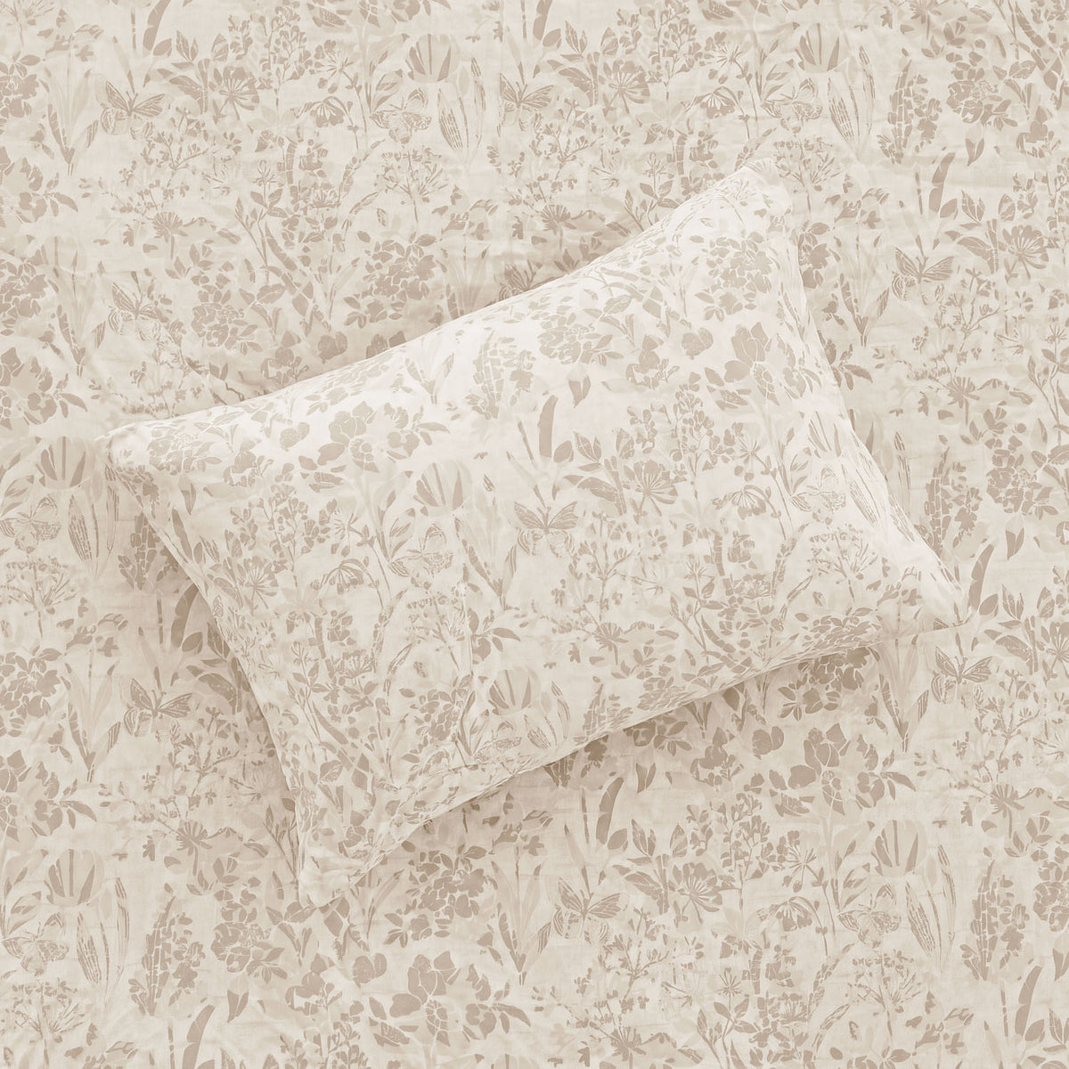 Sofia Home Textiles Printed Bedsheets - Sofia Flowers Printed Double Flat Bedsheet Set 4 Pcs (240 × 260 cm) in Beige spread on a double bed - مفروشات صوفيا - ملايات مطبوعة - طقم ملاية صوفيا ورد دبل مسطحة 4 قطع (240 × 260 سم) باللون بيج مفروش على سرير دبل