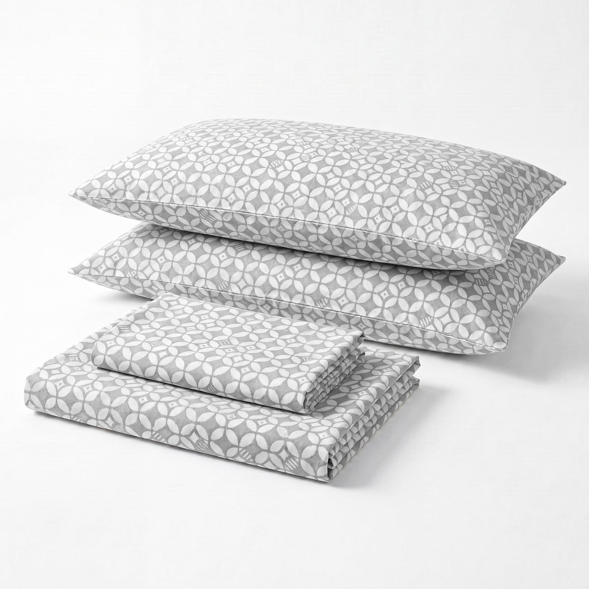 Sofia Home Textiles Printed Bedsheets - Sofia Geometric Flowers Printed Double Flat Bedsheet Set 4 Pcs in Dark Grey folded full set on a white background - مفروشات صوفيا - ملايات مطبوعة - طقم ملاية صوفيا ورد هندسي دبل مسطحة 4 قطع باللون رمادي غامق مطوي كامل على خلفية بيضاء