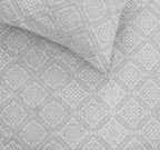 Sofia Home Textiles Printed Bedsheets - pattern details of Sofia Flower Squares printed double bedsheet set in Grey - مفروشات صوفيا - ملايات مطبوعة - تفاصيل نقشة طقم ملاية صوفيا مربعات ورد دبل باللون رمادي