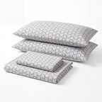 Sofia Home Textiles Printed Bedsheets - Sofia Large Zigzag Printed Double Flat Bedsheet Set 4 Pcs in Grey folded full set on a white background - مفروشات صوفيا - ملايات مطبوعة - طقم ملاية صوفيا زجزاج كبير دبل مسطحة 4 قطع باللون رمادي مطوي كامل على خلفية بيضاء