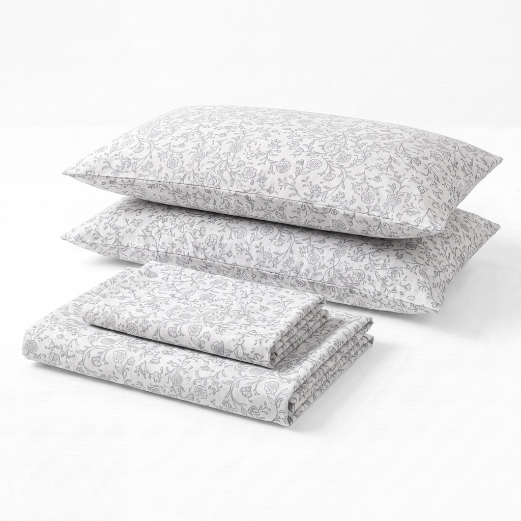 Sofia Home Textiles Printed Bedsheets - Sofia Floral Branches Printed Double Flat Bedsheet Set 4 Pcs in Grey folded full set on a white background- مفروشات صوفيا - ملايات مطبوعة - طقم ملاية صوفيا فروع ورد دبل مسطحة 4 قطع باللون رمادي مطوي كامل على خلفية بيضاء