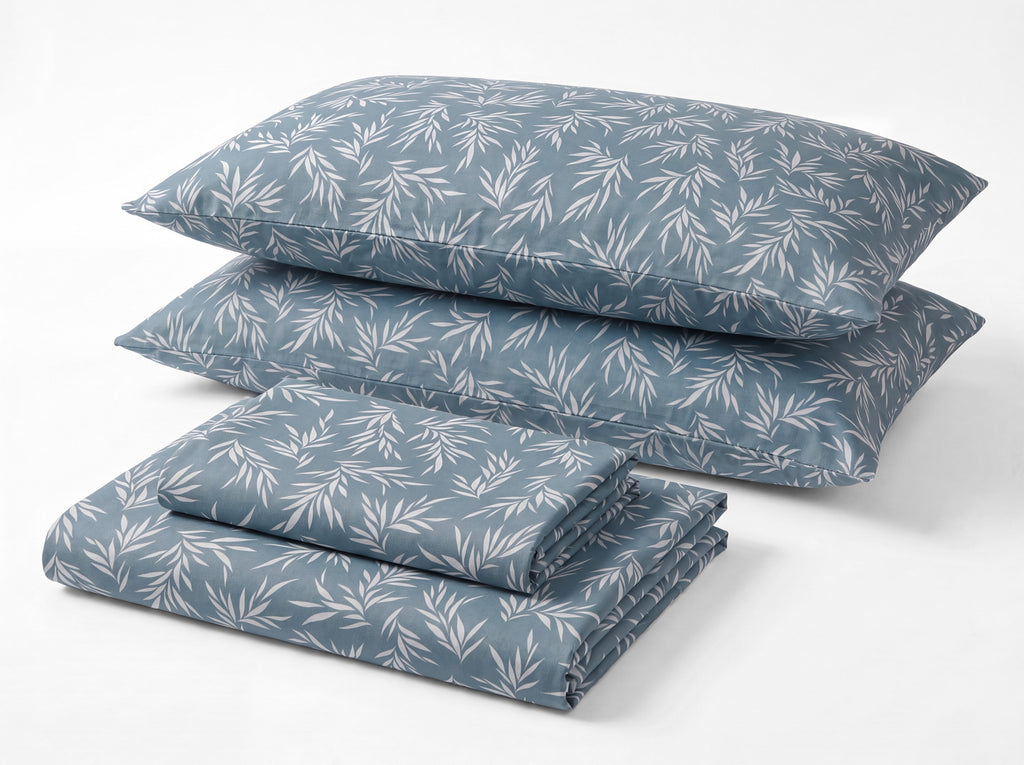 Sofia Home Textiles Printed Bedsheets - Sofia Leaves Printed Double Flat Bedsheet Set 4 Pcs in Petroleum folded full set on a white background - مفروشات صوفيا - ملايات مطبوعة - طقم ملاية صوفيا ورق شجر دبل مسطحة 4 قطع باللون بترولي مطوي كامل على خلفية بيضاء