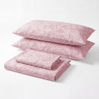 Sofia Home Textiles Printed Bedsheets - Sofia Flowers Printed Double Flat Bedsheet Set 4 Pcs in Rose folded full set on a white background - مفروشات صوفيا - ملايات مطبوعة - طقم ملاية صوفيا ورد دبل مسطحة 4 قطع باللون وردي مطوي كامل على خلفية بيضاء