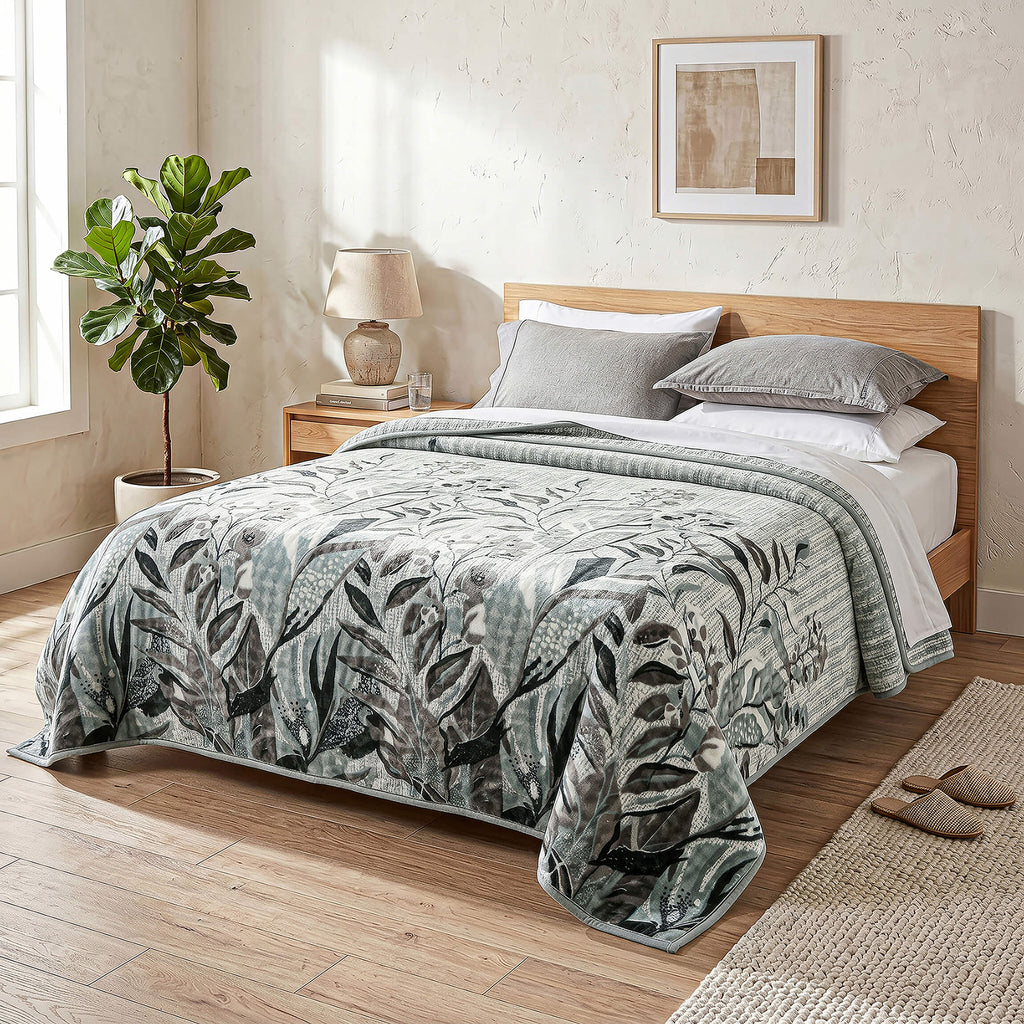 Sofia Home Textiles Blankets - Sofia Zumurruda 2-Ply Double Blanket (240 × 220 cm) Floral Leaves in Mint spread on a double bed - مفروشات صوفيا - بطاطين - بطانية صوفيا زمردة دبل طبقتين (240 × 220 سم) ورد وورق شجر باللون مينت مفروشة على سرير دبل